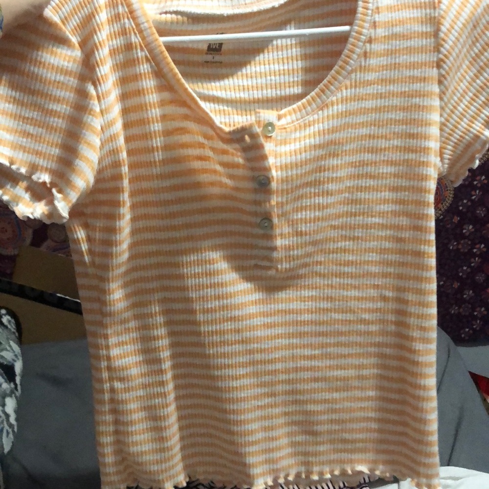 orange and white stripped shirt